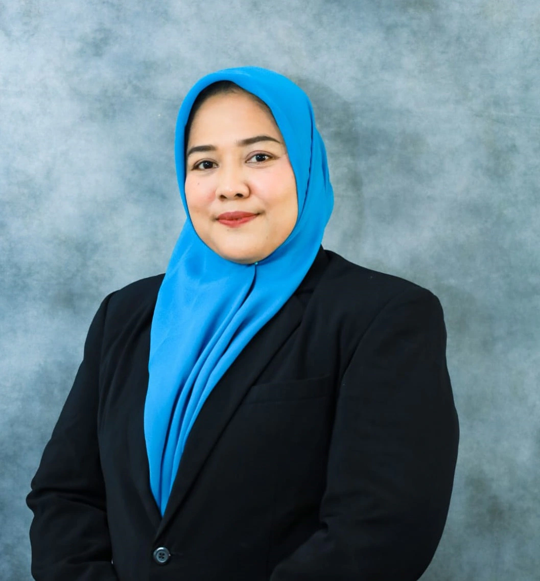 Foto IKE BETRIA, M.Pd